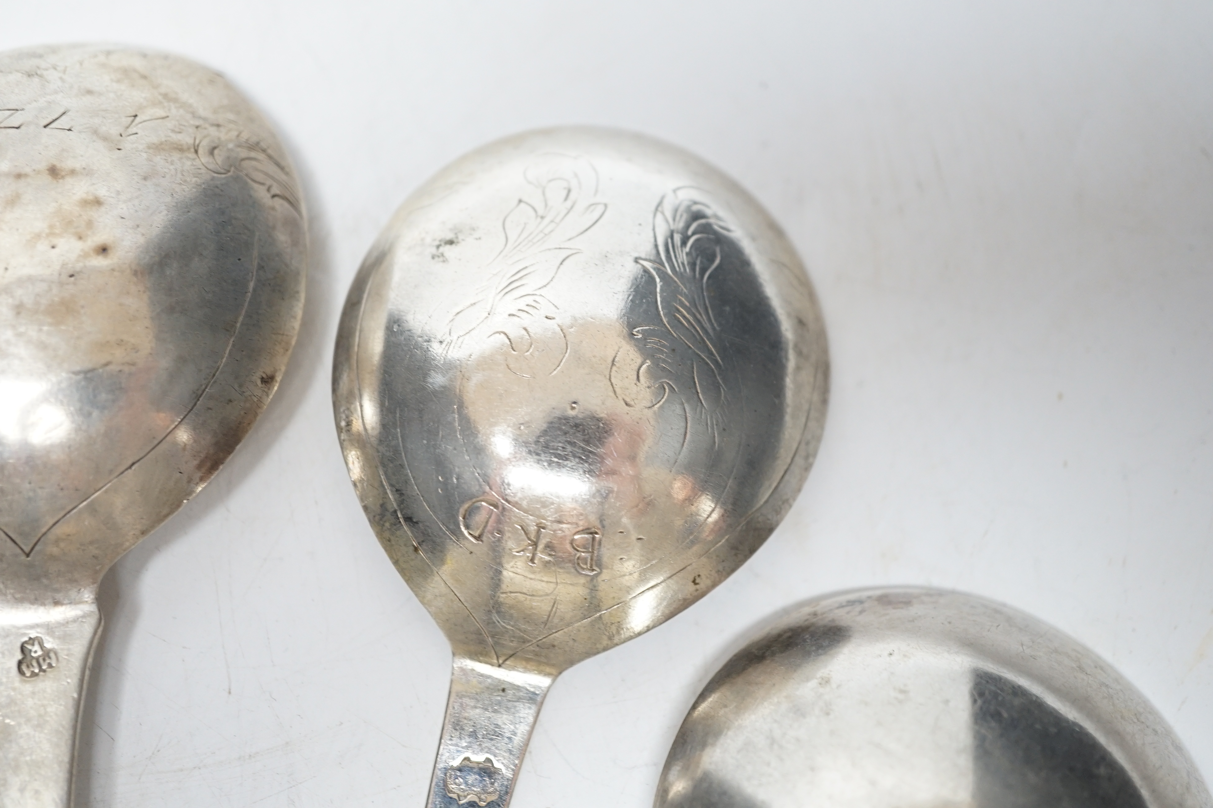 Five assorted 19th century and later Scandinavian? white metal spoons, two with maker's marks, largest 18cm.